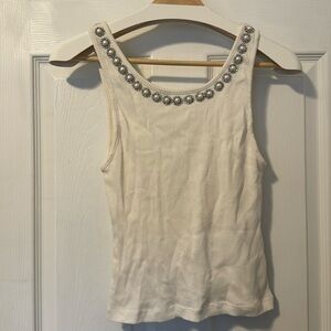 Alice + Olivia White sleeveless cew neck top and pearls by the neck. Size S/P